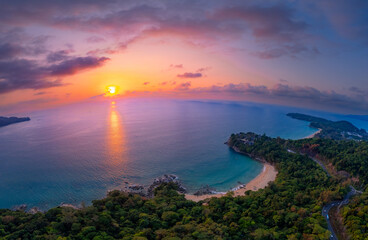 Aerial top view panorama sunset Laem Sing beach with sea of Phuket paradise. Concept tropical...