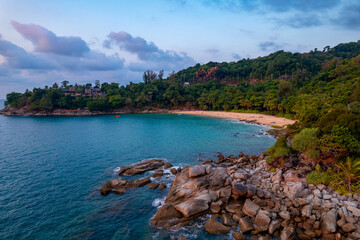 Aerial top view paradise Thai Phuket, blue sea and sand beach with sunset, travel photo Thailand