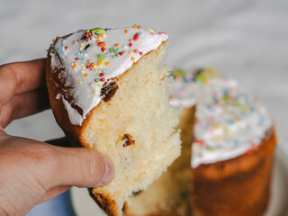 A piece of Easter cake. Kulich closeup. Ukrainian Easter. Orthodox Easter. Panettone, paska