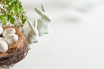 Holiday composition with spring flowers and easter eggs on a light background. Happy easter concept...