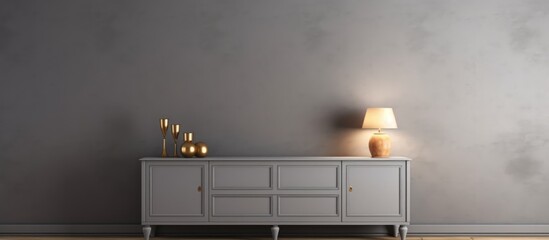 This room features a gray wall and a gray cabinet. The cabinet is empty, with two lamps on either side. The overall color scheme is monochromatic and minimalist.