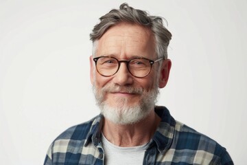 A man wearing glasses and a beard in a plaid shirt. Suitable for business or casual concepts - obrazy, fototapety, plakaty