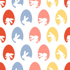 Festive seamless pattern of colorful Easter eggs with cut out bunnies