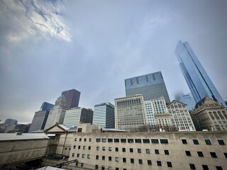 Fototapeta premium view of chicago skyscrapers in the center on a winter day with fog 