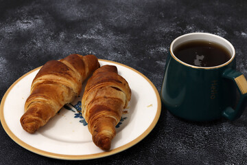Freshly baked croissants, isolated on white background. 