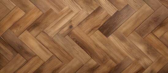 A hardwood floor featuring a chevron pattern, with wooden parquet seamlessly arranged to create a visually striking design.