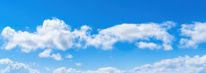 Scenic and Beautiful Bright blue sky with puffy clouds on a clear sunny day