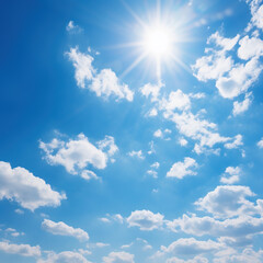 Scenic Bright blue sky with puffy clouds on a clear sunny day with sun in the sky