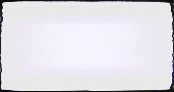 A dirty 35mm film frame distorts and flickers quickly
