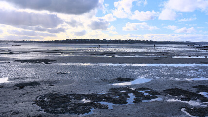 Beach of Lancieux during low tide a winter afternoon 
(Brittany, France)