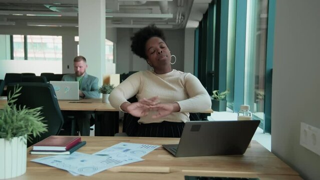 Female workaholic having small break after difficult task