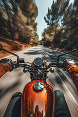 Naklejka premium Closeup of two hands on motorcycle handlebars, motorcyclist on paved road.