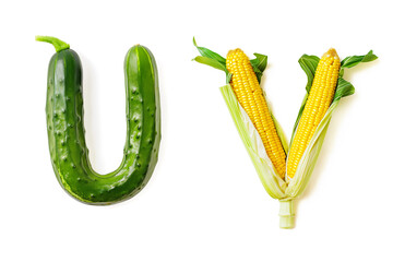 Vegetable Letters "U" and "V" Made of Cucumber and Corn Isolated on White Background