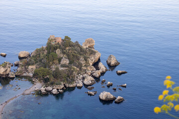 Beautiful view of the picturesque Isola Bella, small rocky island in the Ionian Sea, Taormina,...