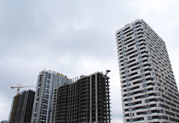 construction of modern office building against the backdrop of high-rise buildings in the city of Kyiv, Ukraine