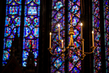 Paris, France - Dec. 27 2022: The stunning stained glass window and the beautiful ceiling in Saint-Chapelle in Paris