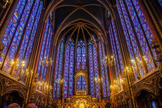 Paris, France - Dec. 27 2022: The stunning stained glass window and the beautiful ceiling in Saint-Chapelle in Paris