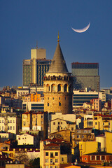 A tower with a lot of windows is in the background. Galata tower, istanbul 