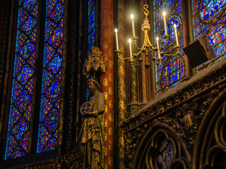 Paris, France - Dec. 27 2022: The stunning stained glass window and the beautiful ceiling in...
