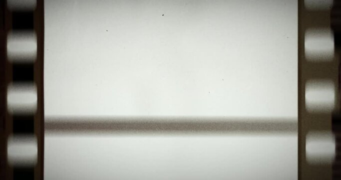 An old film tape moving fast overlay