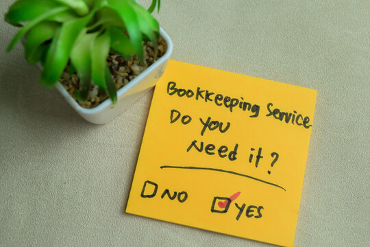 Concept of Bookkeeping Service, Do You Need it? write on sticky notes isolated on Wooden Table.