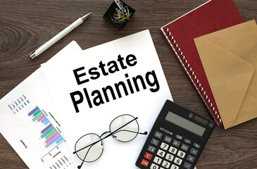 estate planning on the work desk there is a red notepad and an envelope near the calendar and...
