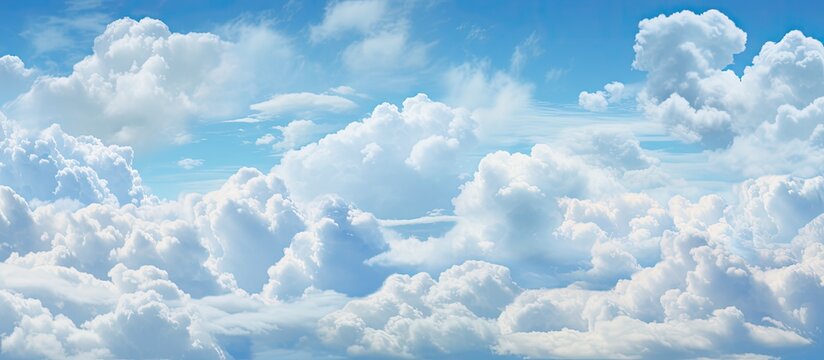 A commercial plane is seen soaring through the altocumulus clouds in a vast blue sky. The clouds create a dynamic backdrop as the aircraft travels on its journey. The scene captures the essence of