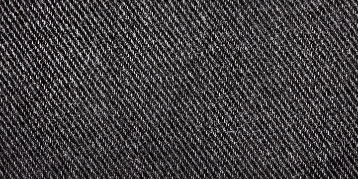 Black denim fabric macro photo. Jeans as a background. Fabric texture.