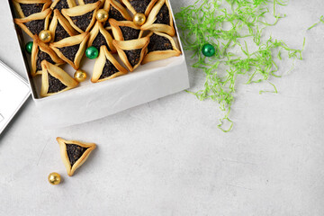 Traditional Jewish Hamantaschen cookies in the box.Purim celebration concept.