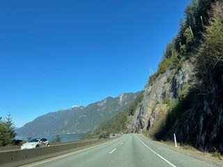 Beautiful day driving on the Sea-to-Sky Highway 99 toward Squamish in British Columbia, Canada