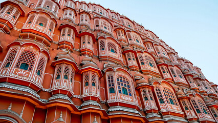Exterior view of Hawa Mahal or Place of winds or breeze, honeycomb construction made of red and...