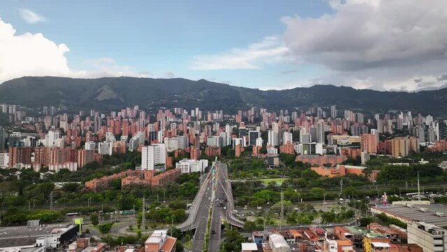 Colombia top cinematic aerial view. El Poblado, Medellín. Panoramic aerial city view. 