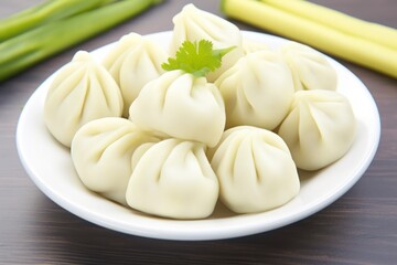 a plate of dumplings on a table