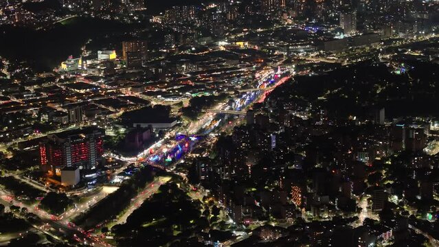 Colombia top cinematic aerial view. El Poblado, Medellín. Panoramic aerial night city view. 
