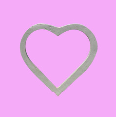 Heart-shaped cement on a pink background, This has clipping path.