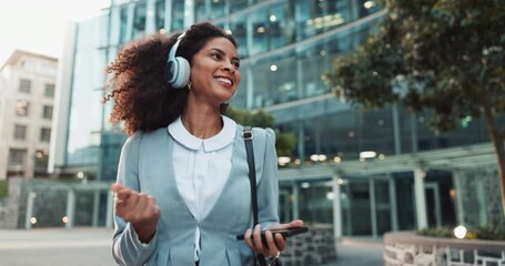 Headphones, dance and business woman in city with phone streaming music, track and radio. Happy, professional and excited person on morning commute, travel and journey to office with smartphone