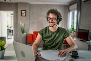 One man caucasian male freelancer work from home on laptop computer