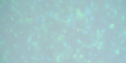 Sparkles defocus light. Glitter paper defocus as background. Blue.