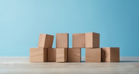  Simplicity in design - Wooden blocks against a blue backdrop