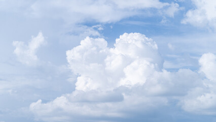 Naklejka na ściany i meble Photograph of clean blue sky and white clouds