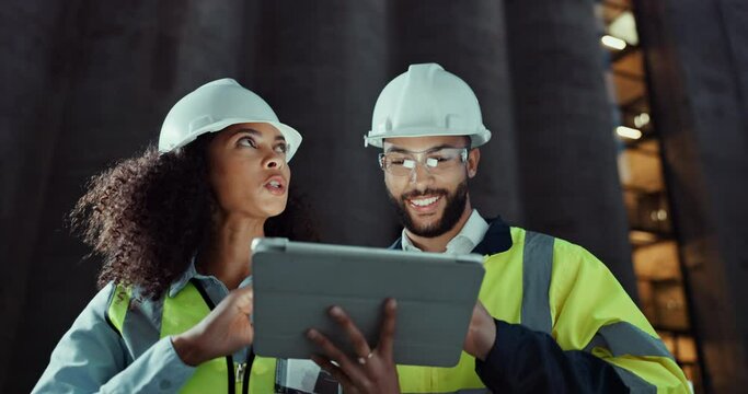 Engineer, people and talking by tablet for teamwork, night civil engineering app for construction in city. Man, woman or building contractor or collaboration or online planning for urban development