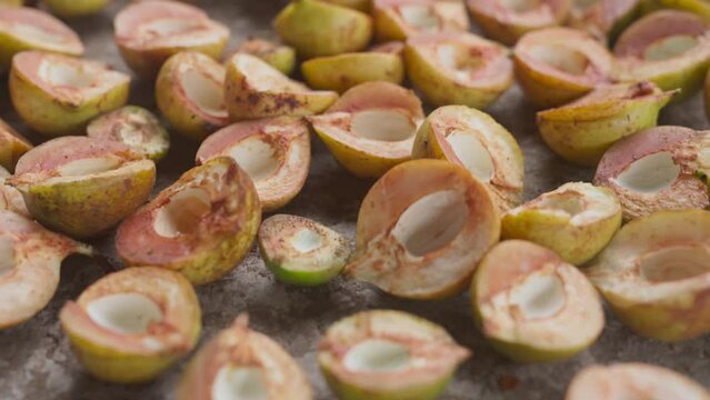 Nutmeg shells being dried to be made into sweets