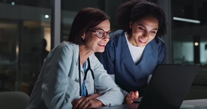 Doctors, women and happy with high five in night by computer, excited and success with results in clinic. Nurse, medic and celebration with laptop, goals and review with feedback, analysis or health