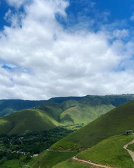 Obraz premium landscape green mountain with clouds