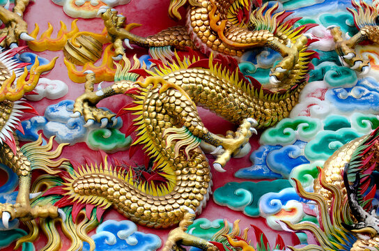 Dragon, head sculpture on wall of temple in Thailand, Symbol of wealth, prosperity.