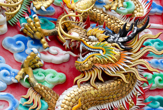 Dragon, head sculpture on wall of temple in Thailand, Symbol of wealth, prosperity.