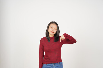 Young Asian woman in Red t-shirt Pointing down at copy space isolated on white background
