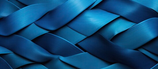 In this close-up view, the vivid blue fabric is prominently displayed. The intricate weave pattern is clearly visible, creating a visually appealing texture. The fabric appears smooth and glossy