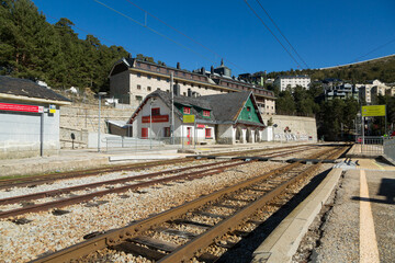 Fototapeta na wymiar Train station in the mountain, the port of Navacerrada. National Park in the Sierra de Guadarrama.