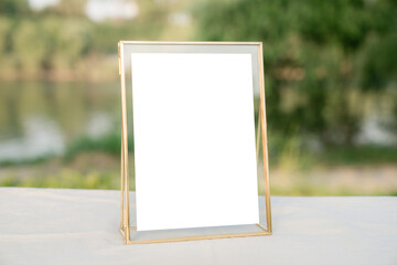 gold frame white blank empty paper mockup 5x7 wedding table number menu sitting notice